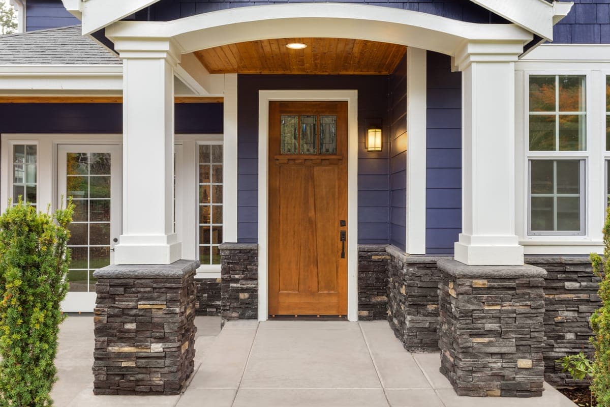 Craftsman-style home with a covered front porch and welcoming entryway